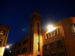 Ferrara, Italy. Alda Costa elementary school, in the twentieth century area of the town. By night.