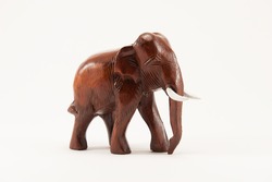 Wooden elephant model on white background
