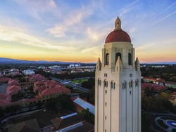 The Hoover Tower and view above Stanford at sunset in Palo Alto in California,