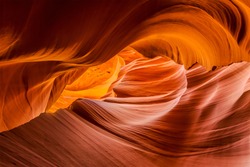 A spiral of rock striations stretches skyward in lower Antelope Canyon, Page, Arizona