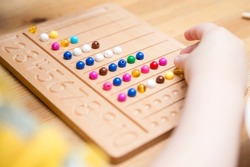 Montessori Beads Board. Learning to count and write numbers, prepare child for mental arithmetic, develop a sense of order, focus, coordination and accuracy.