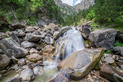 Long exposure of Cotatuero waterfall and river in the Ordesa and Monte Perdido National Park, Aragon, Huesca, Spain.