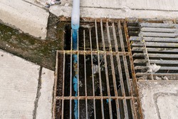 Steel grille of Waste drain hose waste water.