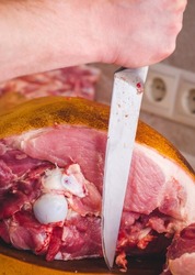 Raw meat diced with kitchen knife and chopping board