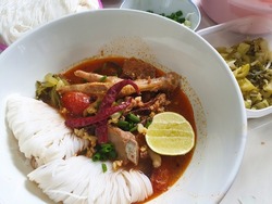 Thai food. North Of Thai food. Rice Vermicelli With Northern Thai Pork Curry.spicy rice noodle soup with pork and pork blood.Thai cuisine