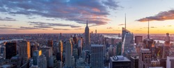 Amazing panorama view of  New York city skyline and skyscraper at sunset. Beautiful night view in Midtown Manhatton.