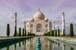 The Taj Mahal Front view with yamunna river with cloud, Agra, Uttar Pradesh, India