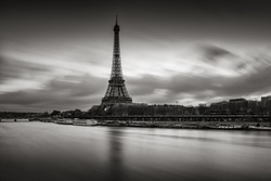Sunrise on the Eiffel Tower and Seine River in winter in Black  White. Port de Suffren, Grenelle, 15th and 7th Arrondissements of Paris, France