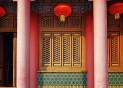 Foshan city, Guangdong, China. Xi Qiao Mountain Guoyi Movie and TV City.  Decorated golden window of Chinese temple.                                      