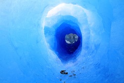 A tunnel in a glacier. Shot in Patagonia, South America.