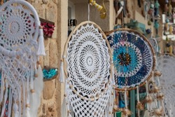Close-up of assorted dream catchers in a tourist gift shop. choose your dream catcher.