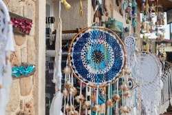 Close-up of assorted dream catchers in a tourist gift shop. choose your dream catcher.