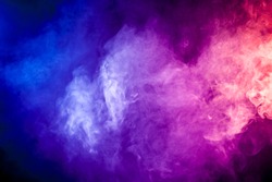 Blue, red, pink abstract cloud of smoke pattern on a black isolated background