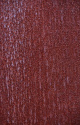 Rusted metal textured background. Redish brown.
