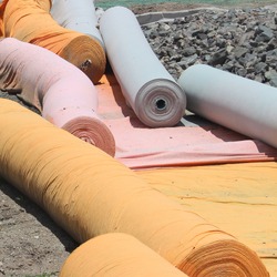 A store of geo textile material rolls on a construction site