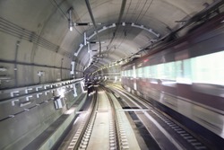 Image of a subway passing through a tunnel - taken at a low speed to give a speed effect