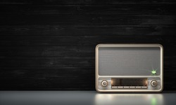 Vintage radio on a black wood background 3d illustration