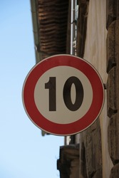 Italy: Road signal (Speed limit 10 kilometers hour).
