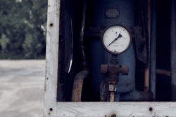 Abandoned Soviet LPG gas station. An old USSR liquefied petroleum gas station in the countryside. Closeup.