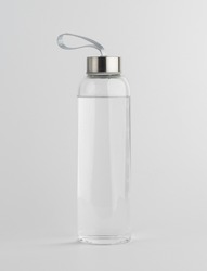 Glass water bottle. Isolated on a white background.