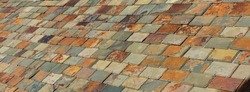 Colorful slate tile rooftop. Multi coloured roof slate tiles