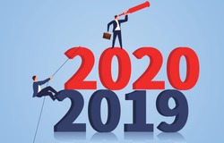 Businessman climbing numbers 2020 and looking to the future