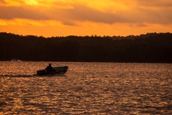 A fishing boat returning home after a good catch on Nelson Lake in Hayward, WI