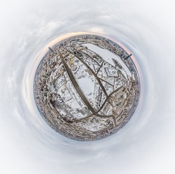 Aerial winter city view with crossroads and roads, houses, buildings, parks and bridges. Copter shot. Little planet sphere mode. Spherical panorama of the city, little planet. Yekaterinburg, Russia.