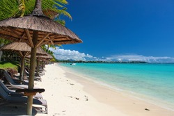 Wonderful beach on Mauritius with palms and white sand
