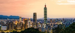 View from above, stunning view of the Taipei City skyline illuminated during a beautiful sunset. Panoramic view from Mount Elephant, Taipei, Taiwan.
