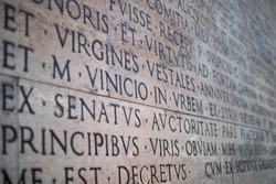 Inscription on a marble slab in Rome with the detail on Virgines. Virgin