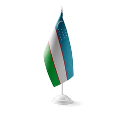 Small national flag of the Uzbekistan on a white background