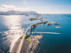 Aerial drone shot of the world famous Atlantic Road is known as ”The Road in the Ocean” in Norway. This fantastic and spectacular road and bridge is a very popular tourist attraction.