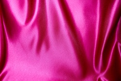 pink satin or silk fabric as background
