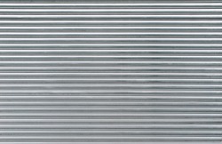Gray metal shutters. Background of horizontal galvanized sheet metal texture.