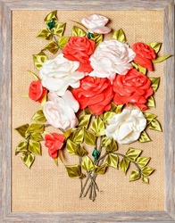 A beautiful and colorful artificial bouquet of red and white roses designed like a 3D painting.