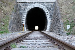 Old tracks through a tunnel 