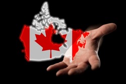 helping hand of Canada, map of Canada in hand on a dark background