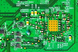 Macro Close up of components and microchips on PC circuit board	