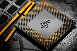 Macro Close up of RAM Memory and pins on Main CPU PC processor circuit board.	