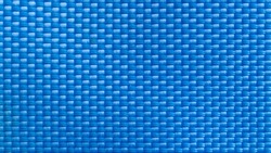 Nylon blue texture. Dark polyester fiber material for sport cloth or abstract weave background. Carbon pattern for wallpaper, graphic design