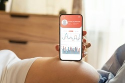 Pregnancy app. Mobile pregnancy online maternity application. Pregnant mother using phone. Pregnancy, medicine, pharmaceutics, health care and people concept