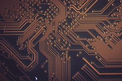 Orange circuit board background used for wallpaper, used as illustrated book,closeup