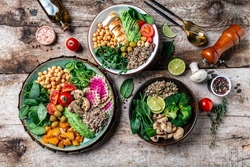 Set of different buddha bowls. Clean and balanced healthy food concept. Chicken grilled meat, green vegetables, chickpeas and quinoa, Halthy eating, dieting food concept. top view
