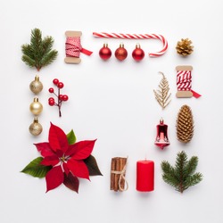 Christmas composition. Frame made of christmas decoration on white background. Flat lay, top view.