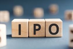 IPO - acronym from wooden blocks with letters, Initial Public Offering IPO concept, random letters around, white  background