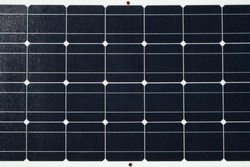 Closeup flexible photovoltaic solar panel.