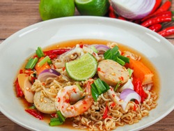 Instant noodle spicy salad with seafood. Yum Mama Thai cuisine Yum traditional spicy hot