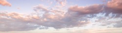 Panorama afternoon sky with clouds. Golden hours sky pattern background