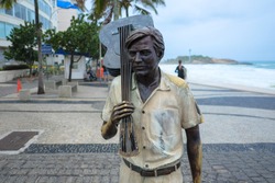 Tom Jobim conductor's statue on the edge of ipanema beach. rio de janeiro